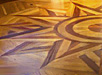 Restauration of the inlayed wooden floors of Casa Cervigón